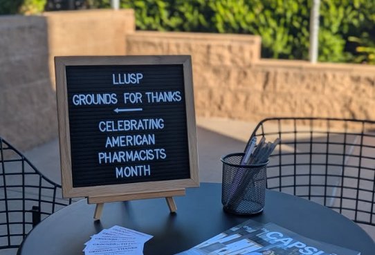 Grounds for Thanks sign outside of coffeeshop
