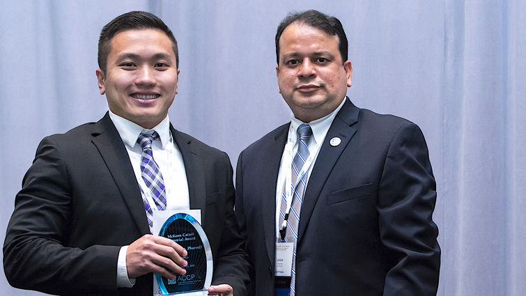 James Truong, PharmD, left, accepted the McKeen Cattell Memorial award last month alongside the president of the ACCP, Dr. Vikram Arya. Photo courtesy of the American College of Clinical Pharmacology.