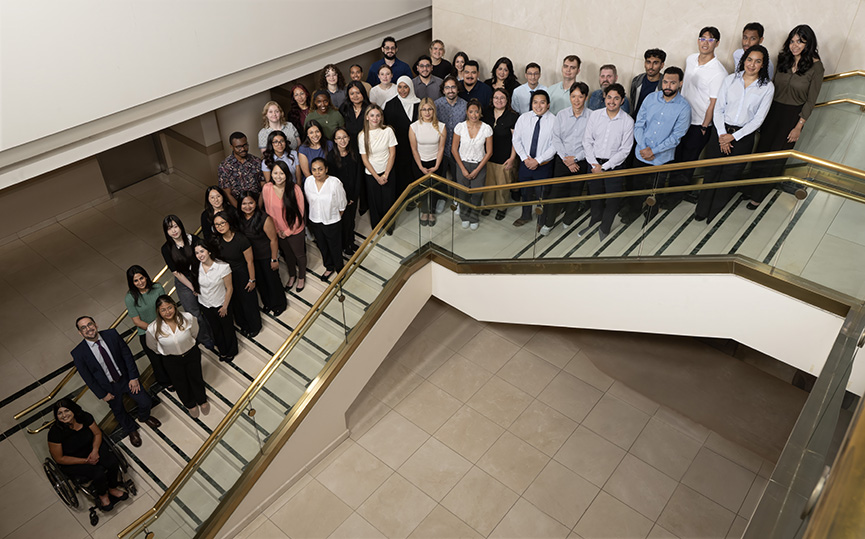 Class of 2030 standing on steps inside the Wong Kerlee building on Loma Linda University Campus