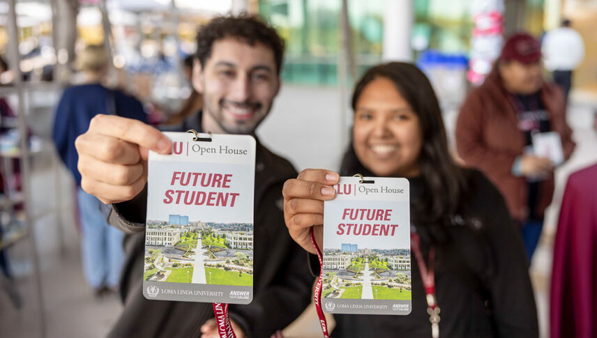 future students holding Open House badges