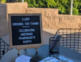 Grounds for Thanks sign outside of coffeeshop
