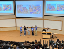 pharmacy students presenting photos from their mission trips around the world